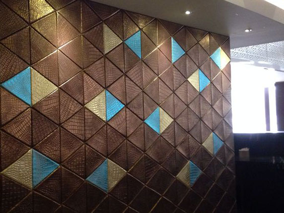 The leather tiles realize the Babylon Hotel in Baghdad a mosaic elegant and exclusive design.
